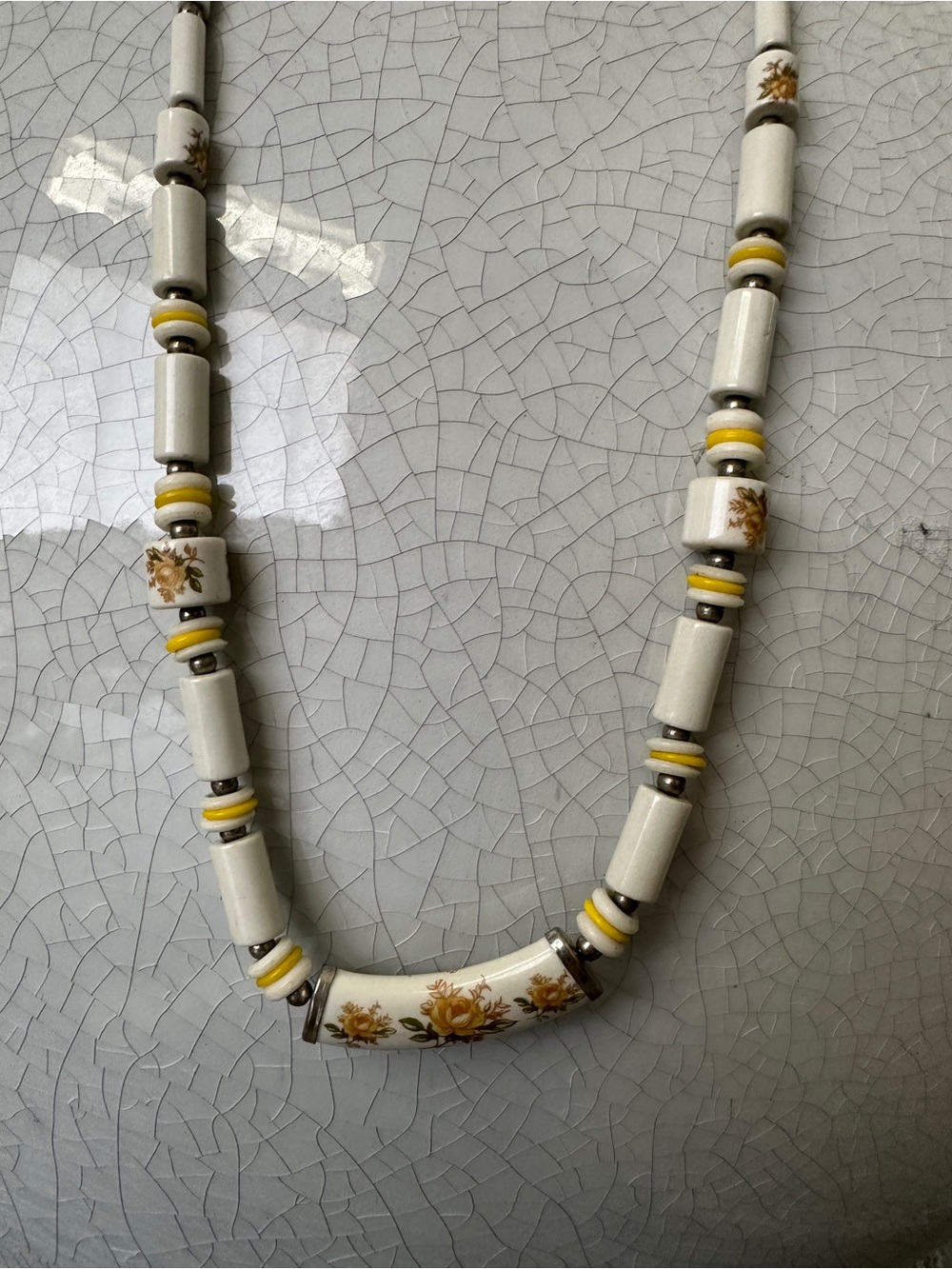 Handcrafted Ceramic Bead Necklace with Yellow Floral Detail